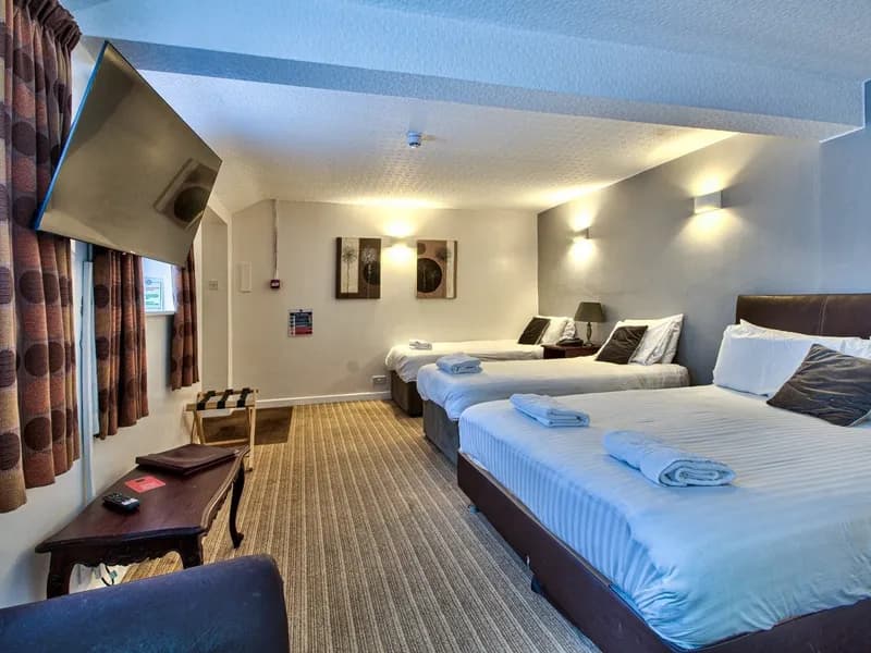 A deluxe family room at The George at Piercebridge